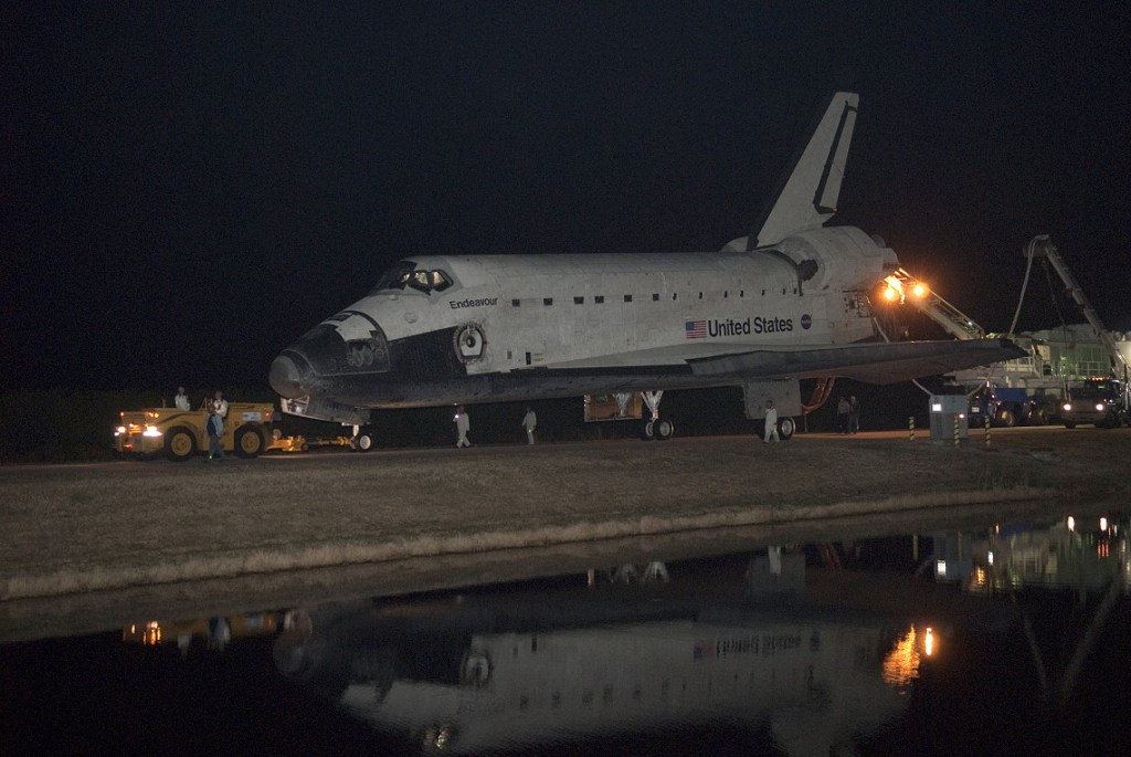 View of a space shuttle parked on the runway.