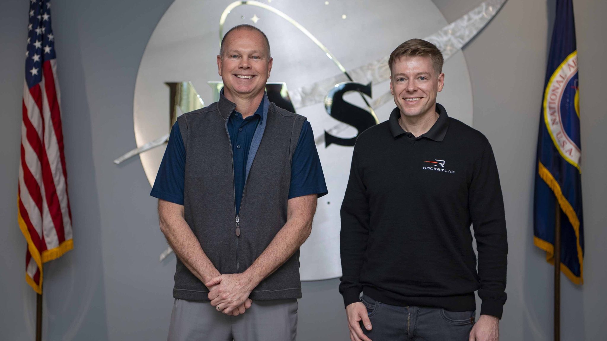 NASA Stennis Director John Bailey, left, stands with Richard French, Rocket Lab USA, Inc. vice president of business development and strategy of space systems