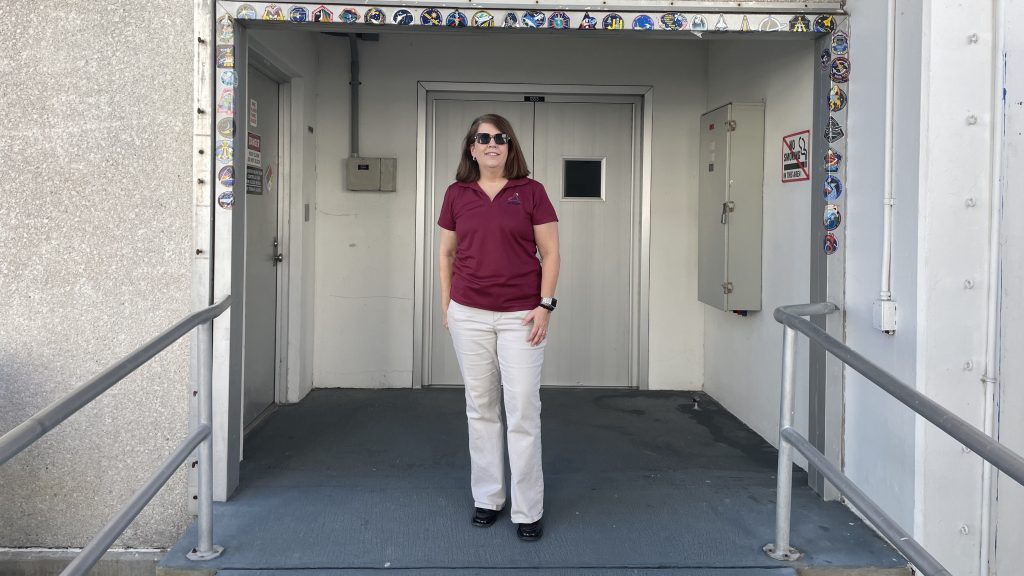 NASA Stennis Deputy Director Christine Powell stands in entryway