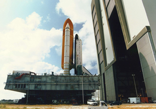 Atlantis moving into the Vehicle Assembly Building for shelter from a possible hurricane.