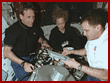  Linenger, Ivins, and Wisoff prepare equipment in hab