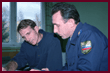 Gagarin Cosmonaut Training Center in Star City: Astronaut Jerry Linenger sits at a table next to a Russian Space Agency trainer during a Mir-23 meeting